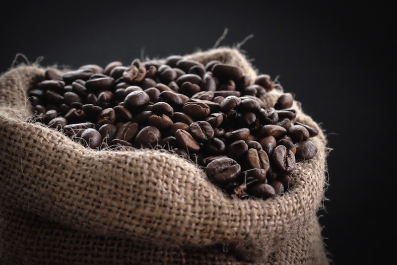 Several bags of specialty coffee beans on a shelf