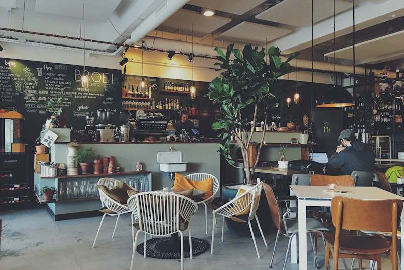 Interior of a busy traditional cafe with patrons at tables